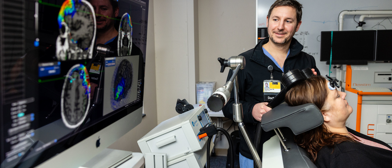 Nicholas Trapp, MD in his lab with simulated patient
